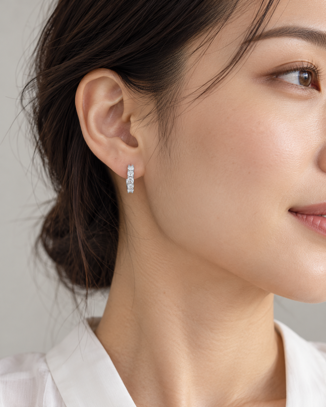 Row Huggie Earrings — AI-generated wearing view