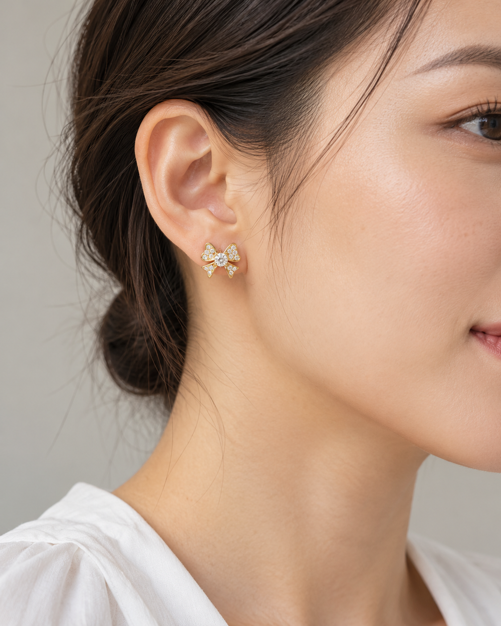 Bow Studs — AI-generated wearing view