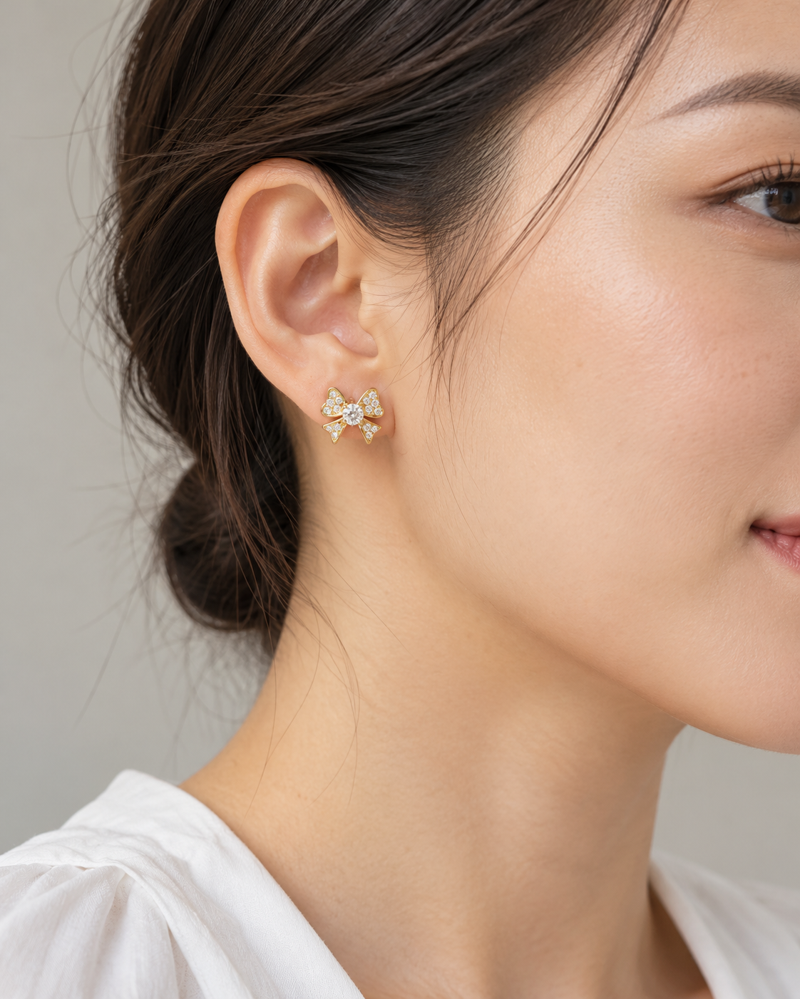 Bow Studs — AI-generated wearing view